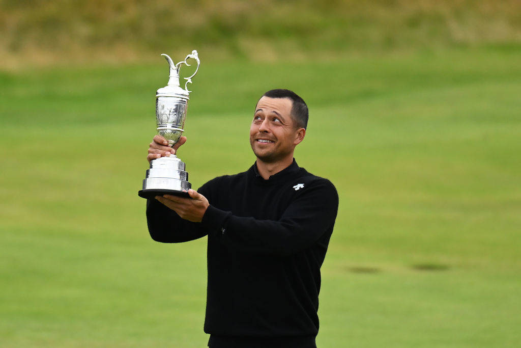 Xander Schauffele looks at the Claret Jug